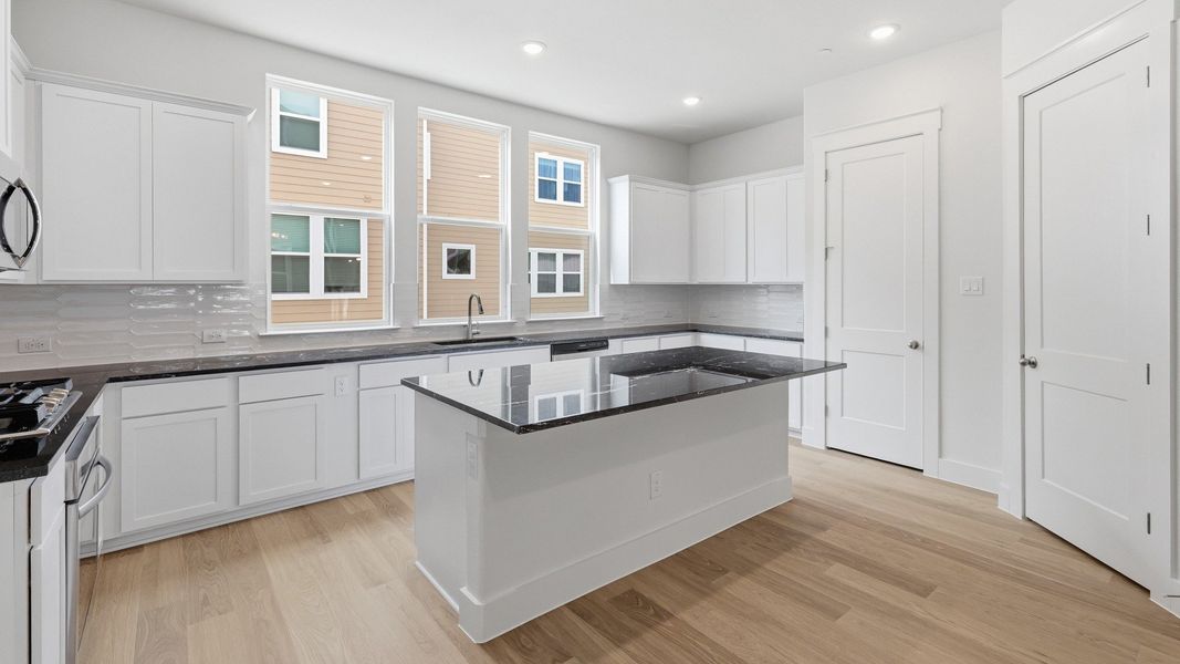 Furnished interior view inside a new home in Collin Creek, Plano (Image 26).
