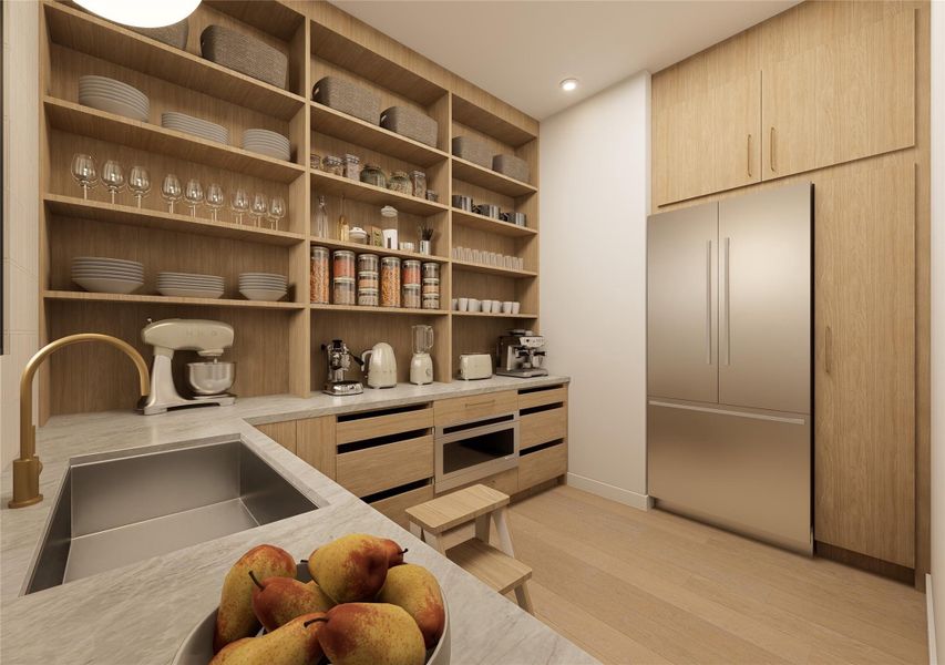 A beautifully appointed working pantry designed for effortless entertaining, complete with extensive open shelving for curated displays and seamless appliance integration. Warm wood cabinetry, stone counters, and a secondary sink create a refined prep space that keeps the main kitchen pristine. A beautifully appointed working pantry designed for effortless entertaining, complete with extensive open shelving for curated displays and seamless appliance integration. Warm wood cabinetry, stone counters, and a secondary sink create a refined prep space that keeps the main kitchen pristine.
