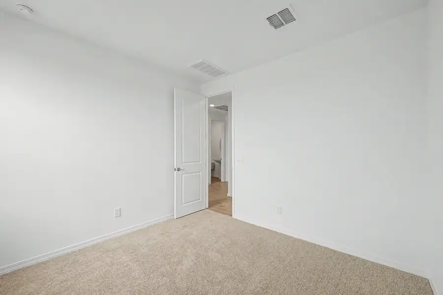 Spacious, unfurnished interior of a new home in White Tank Vistas, Waddell (Image 15). Spacious, unfurnished interior of a new home in White Tank Vistas, Waddell (Image 15).
