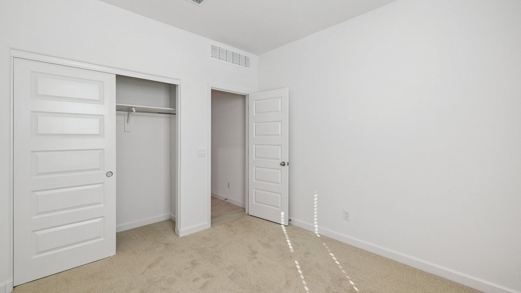 Spacious, unfurnished interior of a new home in Desert Moon Estates, Buckeye (Image 16).