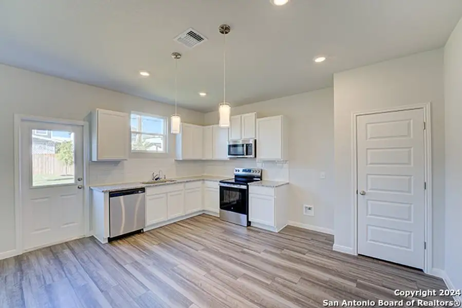 Furnished interior view inside a new home in Blue Ridge Ranch, San Antonio (Image 6).