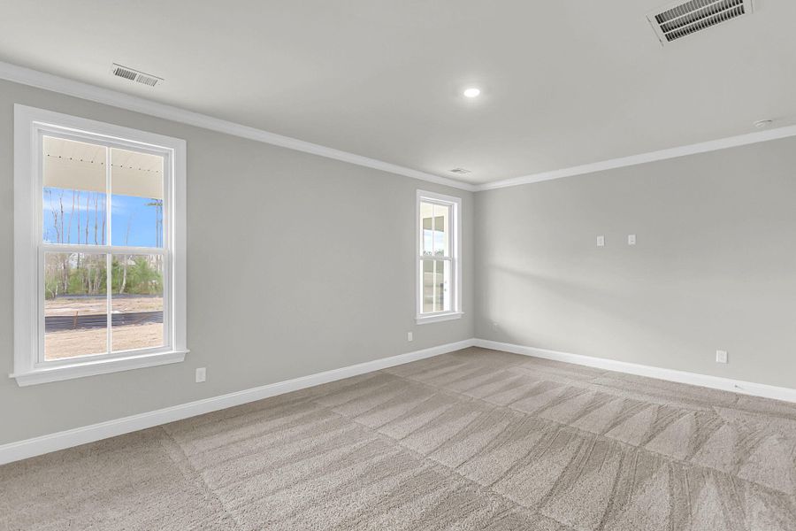 Spacious, unfurnished interior of a new home in Tidewater at Lakes of Cane Bay, Summerville (Image 40).