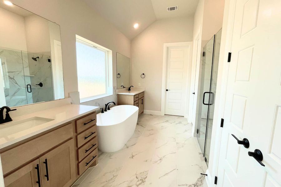Furnished interior view inside a new home in Whisper Valley, Manor (Image 7).