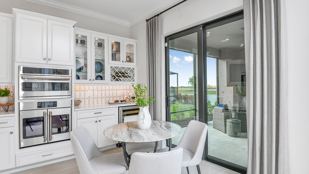 Representative furnished interior of a home built from the Lazio by Taylor Morrison in Astor Creek Golf and Country Club, Port St. Lucie (Image 5).