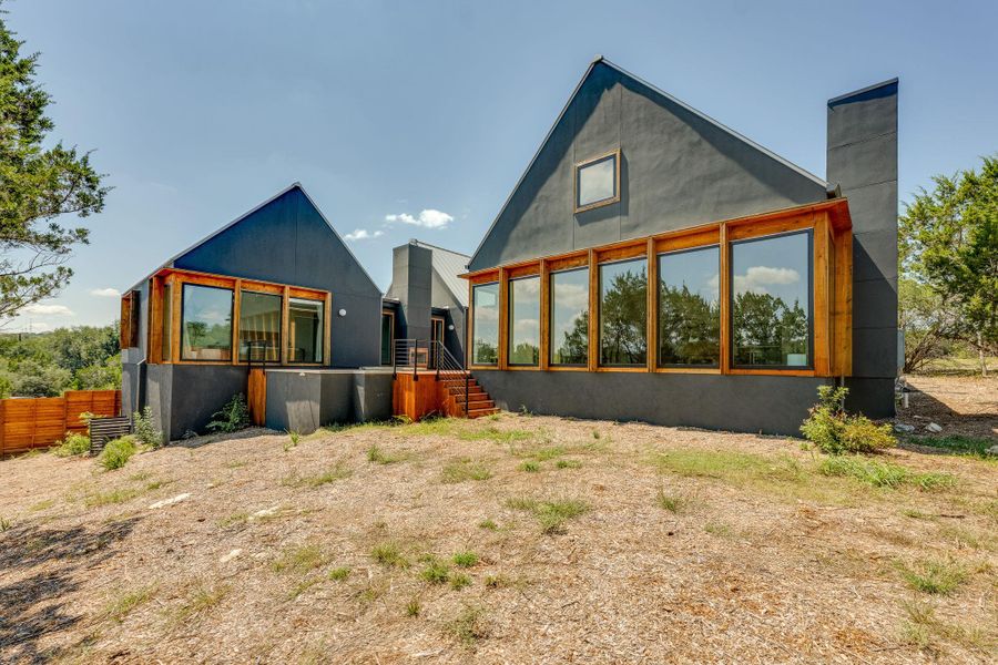 Front exterior of a new home in , Austin, TX, highlighting curb appeal (Image 18). Front exterior of a new home in , Austin, TX, highlighting curb appeal (Image 18).