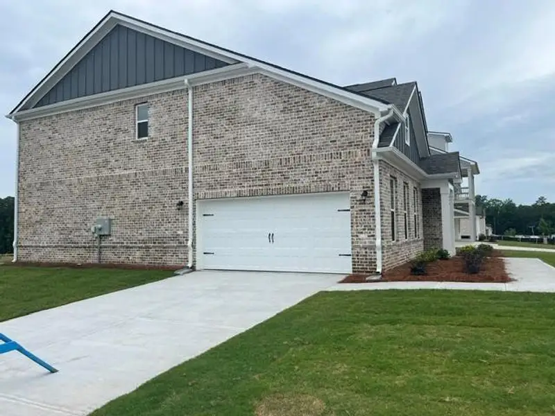 Exterior details and patio area of a home in Bowers Farm, McDonough (Image 3).