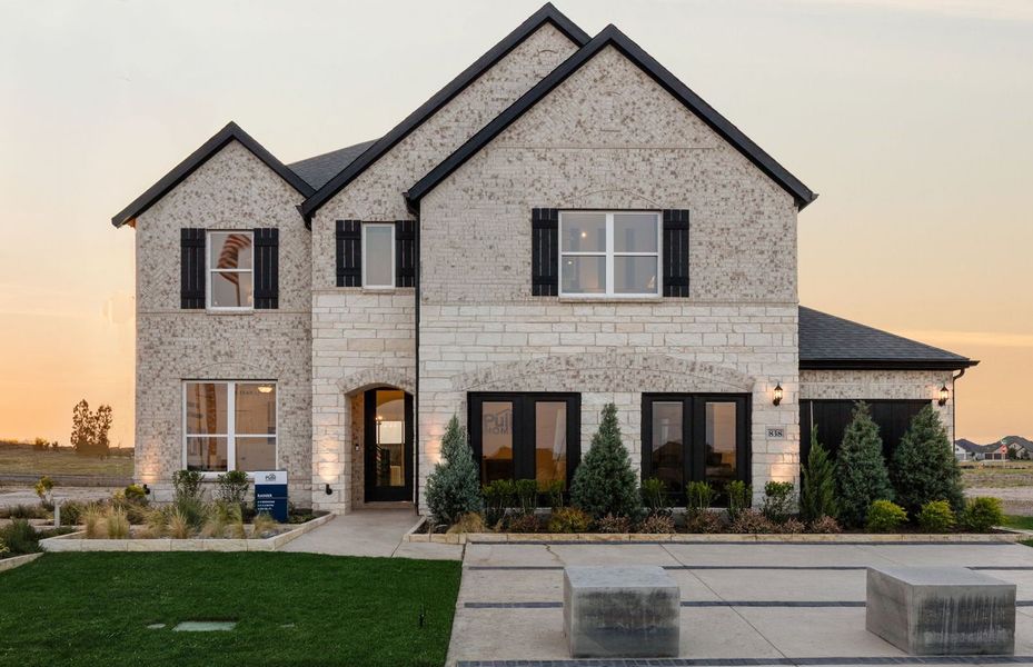 Representative exterior photo of a completed home built from the Rainier by Pulte Homes in Overland Grove, Forney, TX (Image 28).