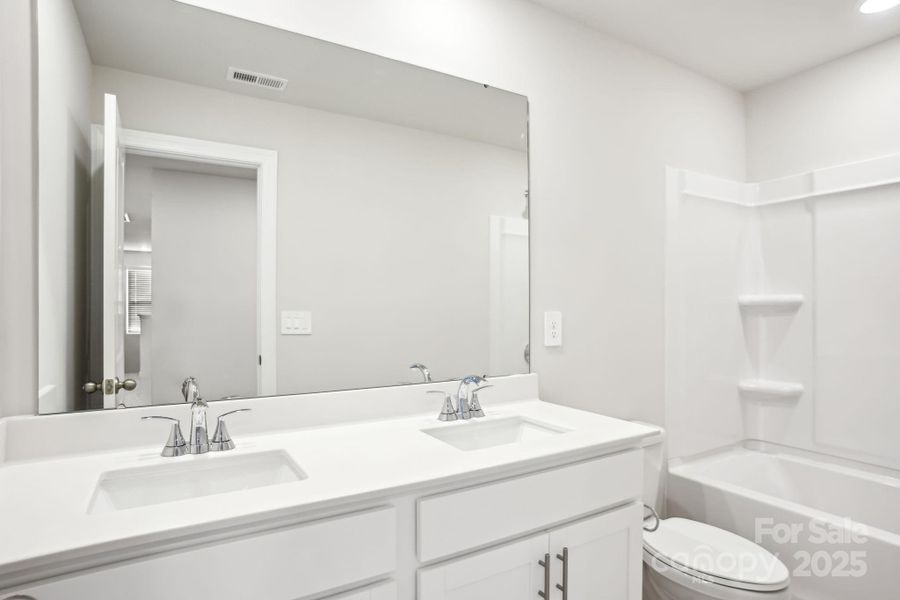 Photo is not of the actual home, but is an inspirational photo of builder’s model home and may depict options, furnishings, and/or decorator features that are not included Photo is not of the actual home, but is an inspirational photo of builder’s model home and may depict options, furnishings, and/or decorator features that are not included