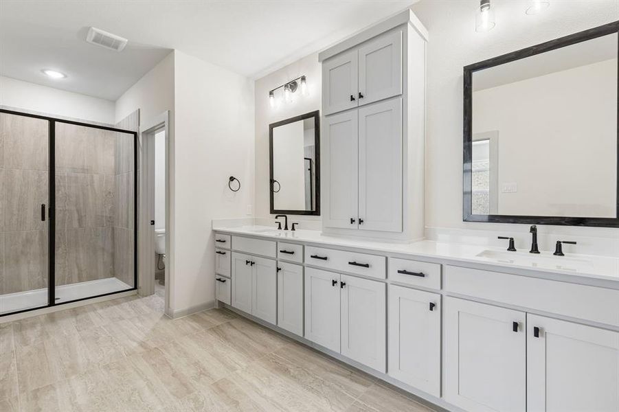 The thoughtful design of this owner's bath offers wonderful storage and plenty of room for two! The thoughtful design of this owner's bath offers wonderful storage and plenty of room for two!