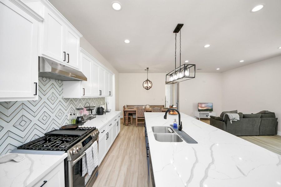 Rich Finishes From Quartz To Backsplash