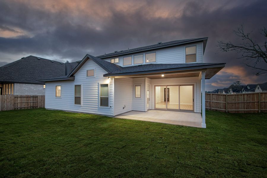 Exterior details and patio area of a home in The Reserve at Potranco Oaks, Castroville (Image 25).