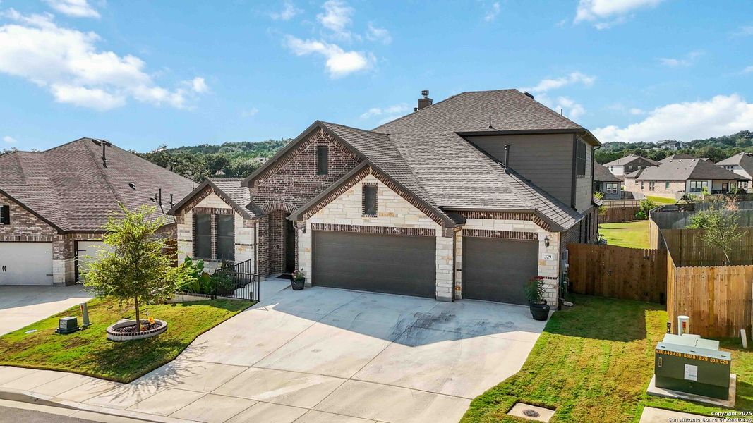 Front exterior of a new home in The Preserve at Singing Hills 50's, Spring Branch, TX, highlighting curb appeal (Image 20).