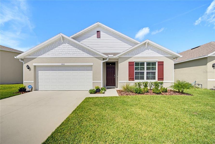 Front exterior of a new home in , Ocoee, FL, highlighting curb appeal (Image 2). Front exterior of a new home in , Ocoee, FL, highlighting curb appeal (Image 2).