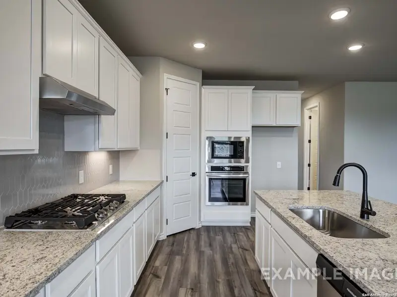 Furnished interior view inside a new home in Ladera, San Antonio (Image 7).