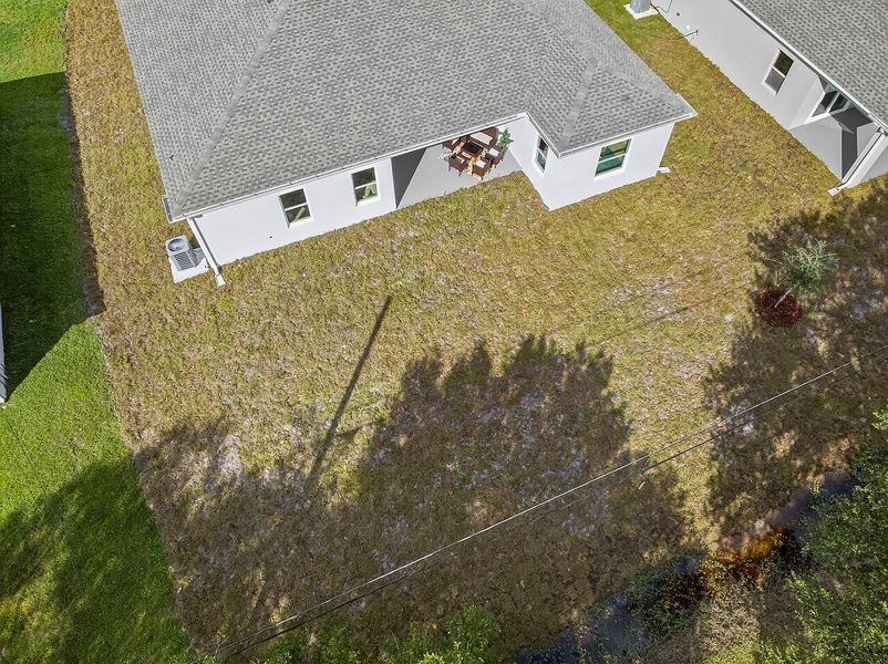 Exterior details and patio area of a home in , Vero Beach (Image 2). Exterior details and patio area of a home in , Vero Beach (Image 2).