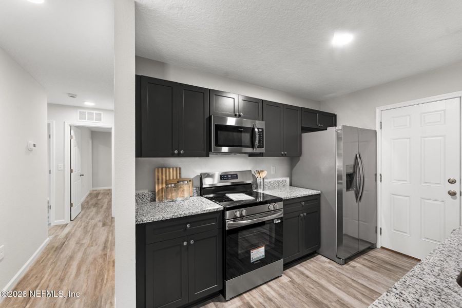 Furnished interior view inside a new home in , Jacksonville (Image 14).