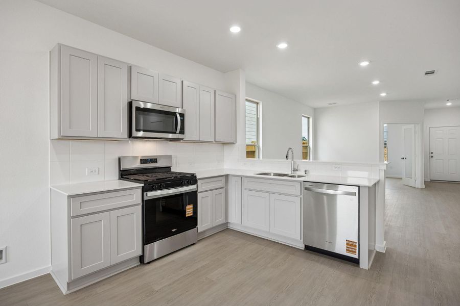 Furnished interior view inside a new home in Crosby Farms, Crosby (Image 8).
