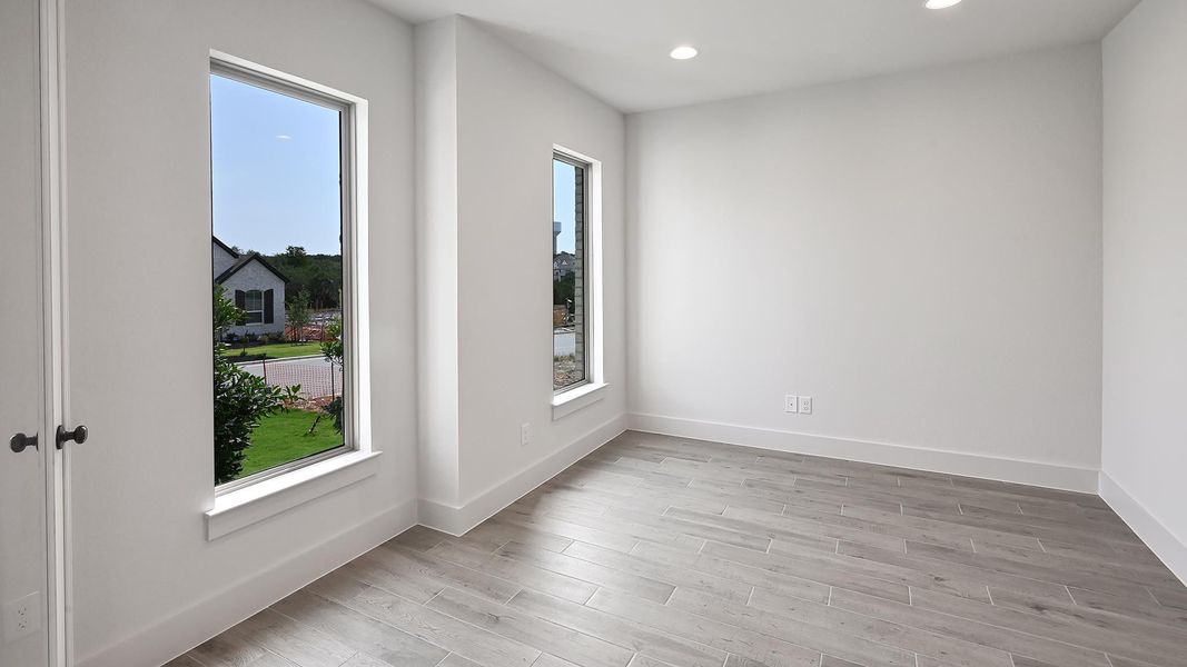 Kitchen featuring open shelves, a sink, white cabinets, tasteful backsplash, and recessed lighting