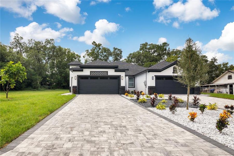 Front exterior of a new home in , Apopka, FL, highlighting curb appeal (Image 32).