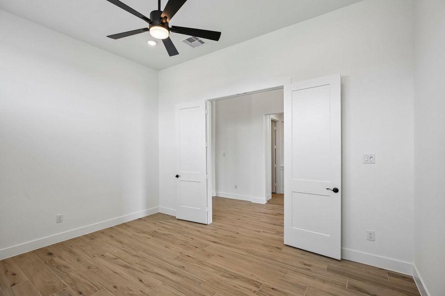 Spacious, unfurnished interior of a new home in Riceland 60',65',70', Old River-Winfree (Image 41).