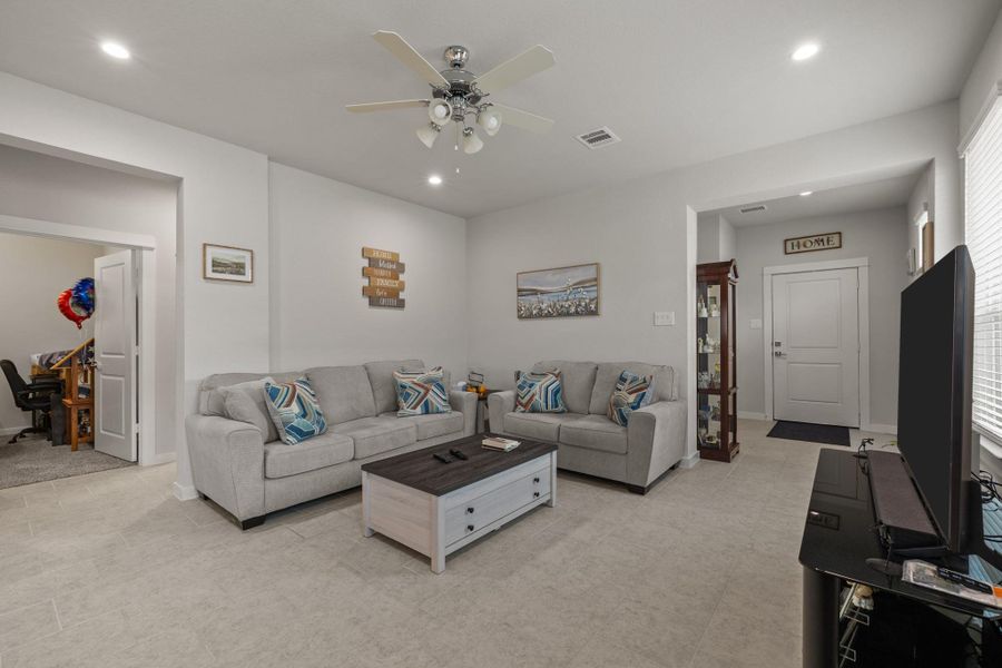 Furnished interior view inside a new home in , Iowa Colony (Image 17).