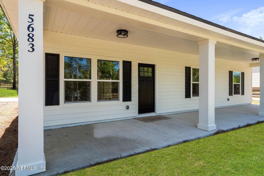Front exterior of a new home in , Keystone Heights, FL, highlighting curb appeal (Image 20).