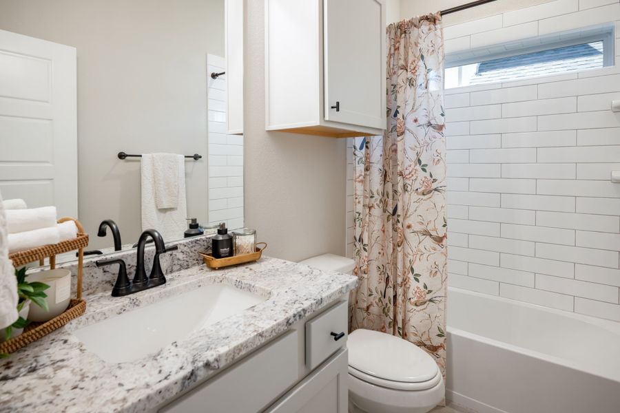 Furnished interior view inside a new home in Greens Prairie Reserve, College Station (Image 12).