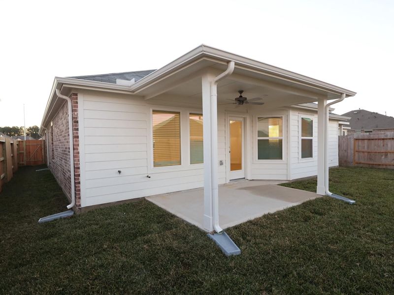 Exterior details and patio area of a home in Magnolia Ridge, Magnolia (Image 4).