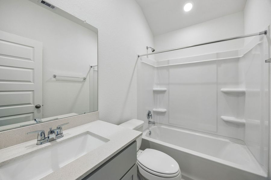 Furnished interior view inside a new home in Meridiana, Manvel (Image 10).