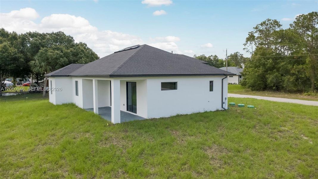 Exterior details and patio area of a home in , Lehigh Acres (Image 3).