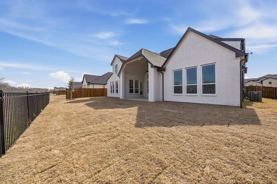 Exterior details and patio area of a home in Light Farms Graham/Reagan, Celina (Image 4).