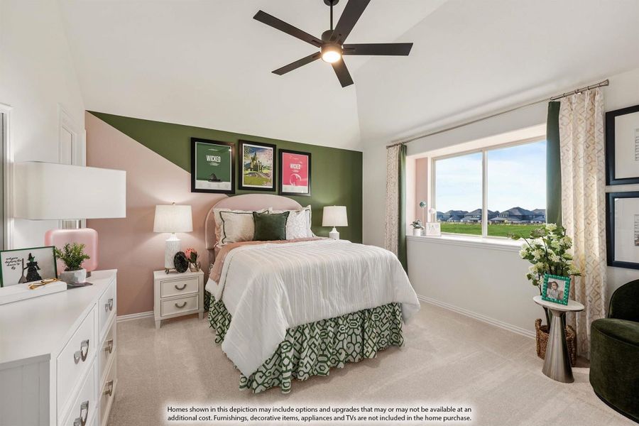 Bedroom with vaulted ceiling, ceiling fan, green and pink accent wall, and large window with outdoor view