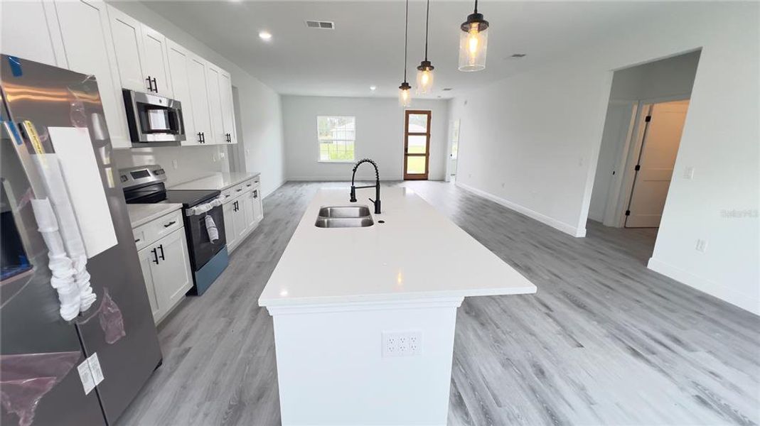 Furnished interior view inside a new home in , Ocala (Image 12).