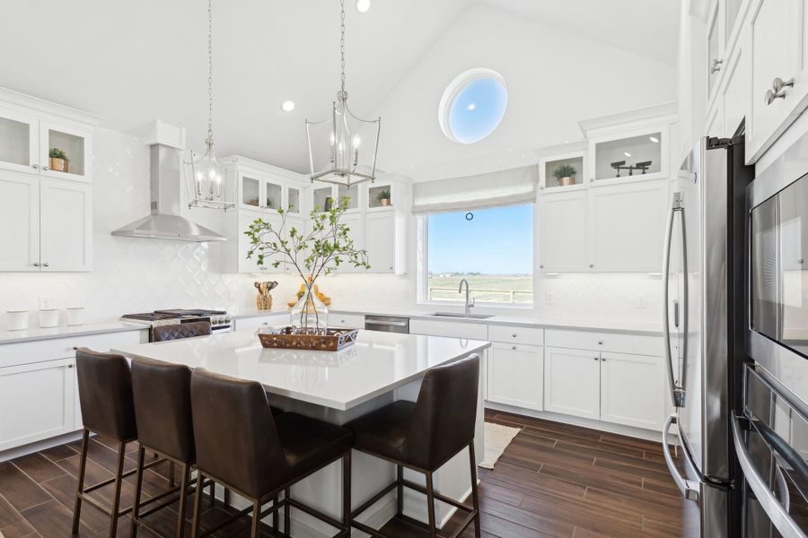 Kitchen with glass upper cabinets