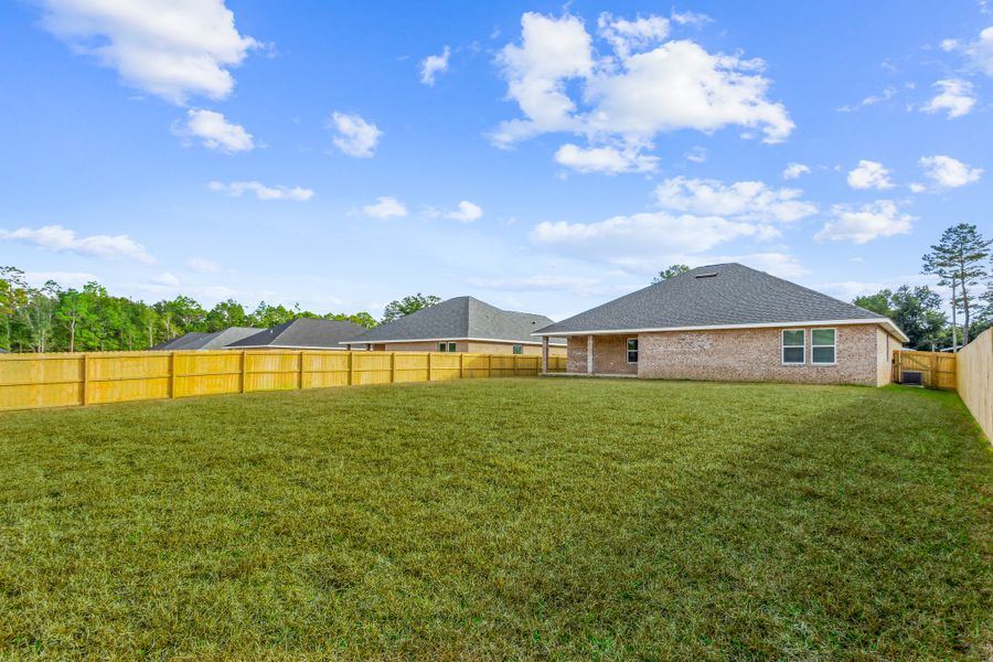 Representative exterior photo of a completed home built from the The Liberty by Herbst Homes in Clear Water Landing, Milton, FL (Image 33).
