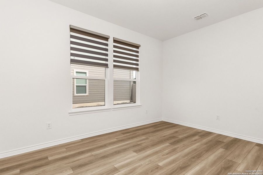 Spacious, unfurnished interior of a new home in Cove at Westover Hills, San Antonio (Image 15).