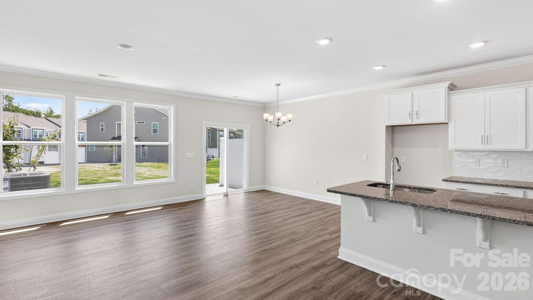 Open kitchen, living and dining space Open kitchen, living and dining space