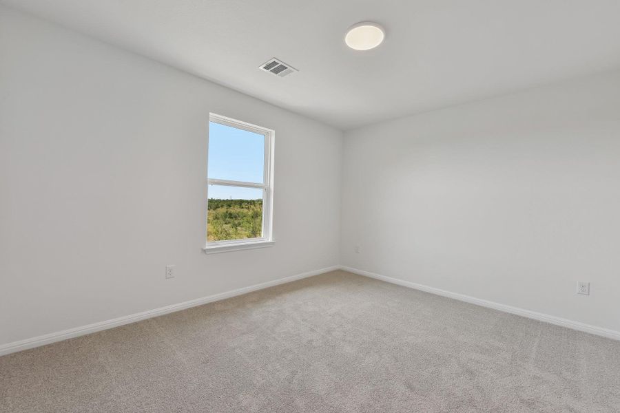 Spacious, unfurnished interior of a new home in Saddle Ridge at Wildhorse Ranch, Austin (Image 23).