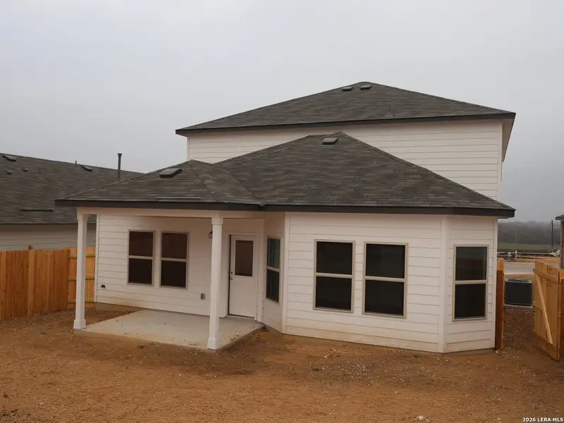 Exterior details and patio area of a home in Mesquite Ridge, San Antonio (Image 4).