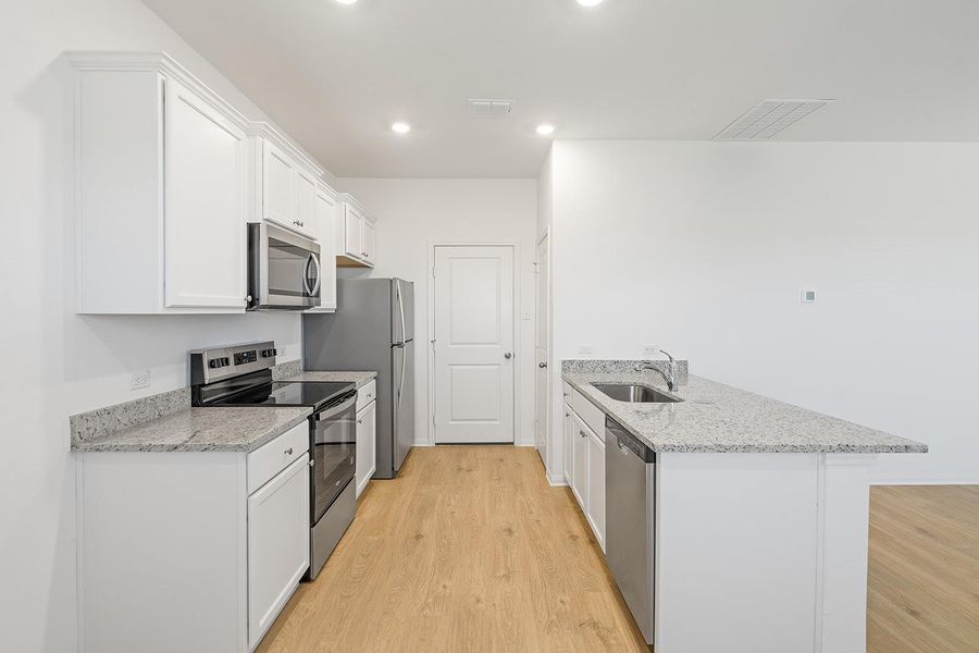 Furnished interior view inside a new home in Canyon Ranch, Jarrell (Image 5).