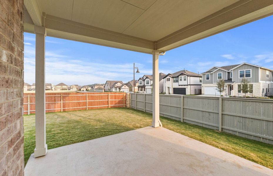 Exterior details and patio area of a home in Saddleback at Santa Rita Ranch, Liberty Hill (Image 26). Exterior details and patio area of a home in Saddleback at Santa Rita Ranch, Liberty Hill (Image 26).