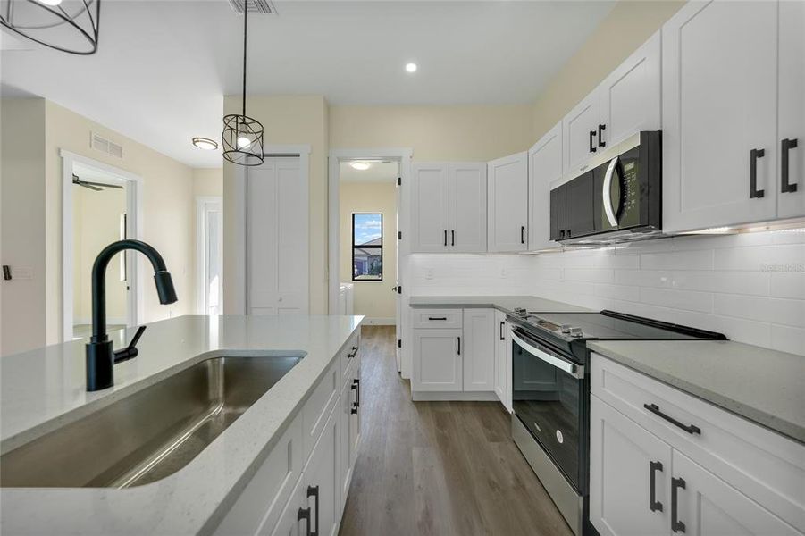 Furnished interior view inside a new home in , Cape Coral (Image 8). Furnished interior view inside a new home in , Cape Coral (Image 8).