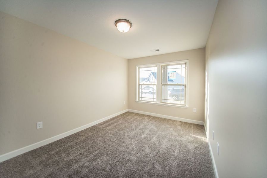 Representative unfurnished interior of a home built from the Inman by Enchanted Homes in Hampshire Heights, Moore (Image 22).
