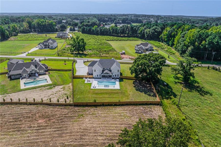 Front exterior of a new home in , Dacula, GA, highlighting curb appeal (Image 24).