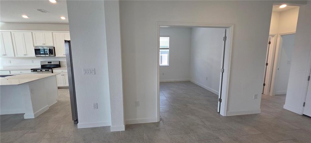 Spacious, unfurnished interior of a new home in Rye Ranch: Manor Homes, Parrish (Image 12).