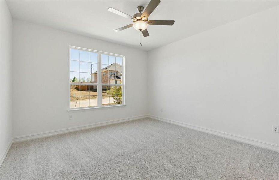 Spacious secondary bedroom features ample closet space Spacious secondary bedroom features ample closet space