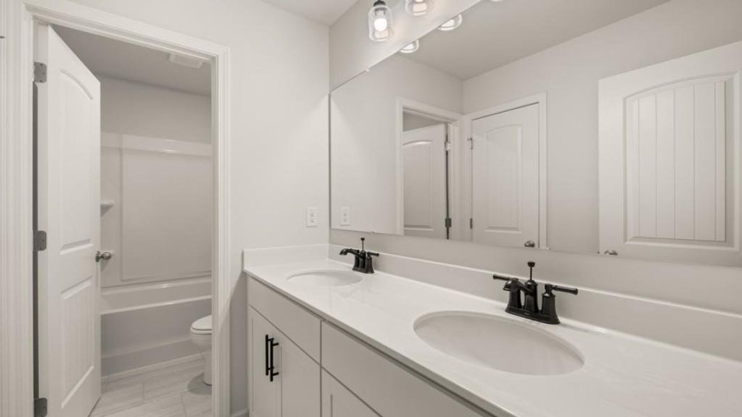 Furnished interior view inside a new home in Haven Abbey, Cumming (Image 9).