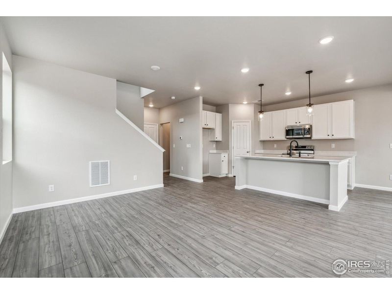 Spacious, unfurnished interior of a new home in Parkway at Prairie Center Village, Brighton (Image 13).