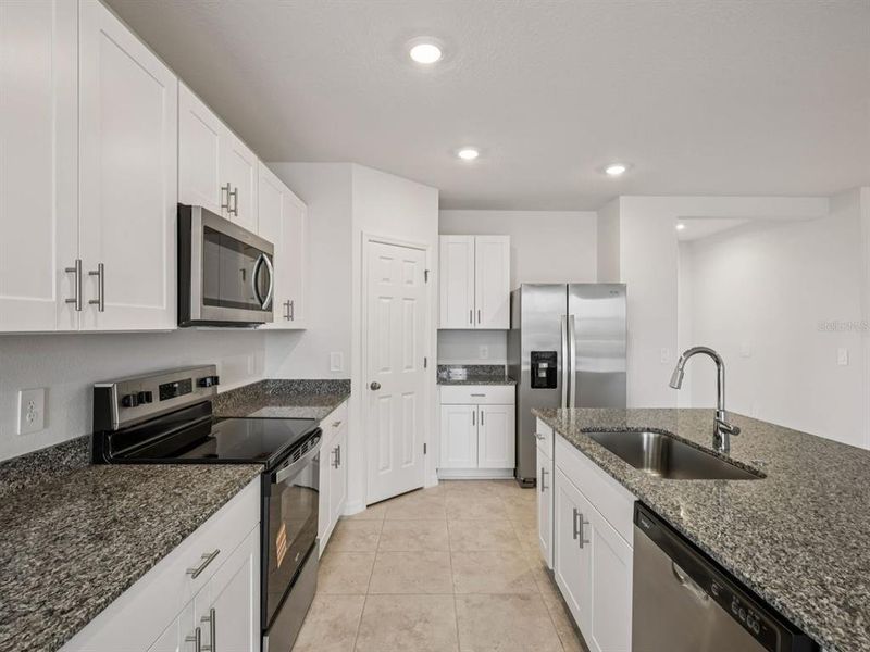 Furnished interior view inside a new home in , Winter Haven (Image 2). Furnished interior view inside a new home in , Winter Haven (Image 2).