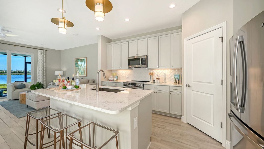 Representative furnished interior of a home built from the Parker by Neal Communities in SkySail, Naples (Image 13).